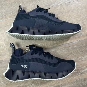 Reebok  Women’s Navy and White Sneakers
